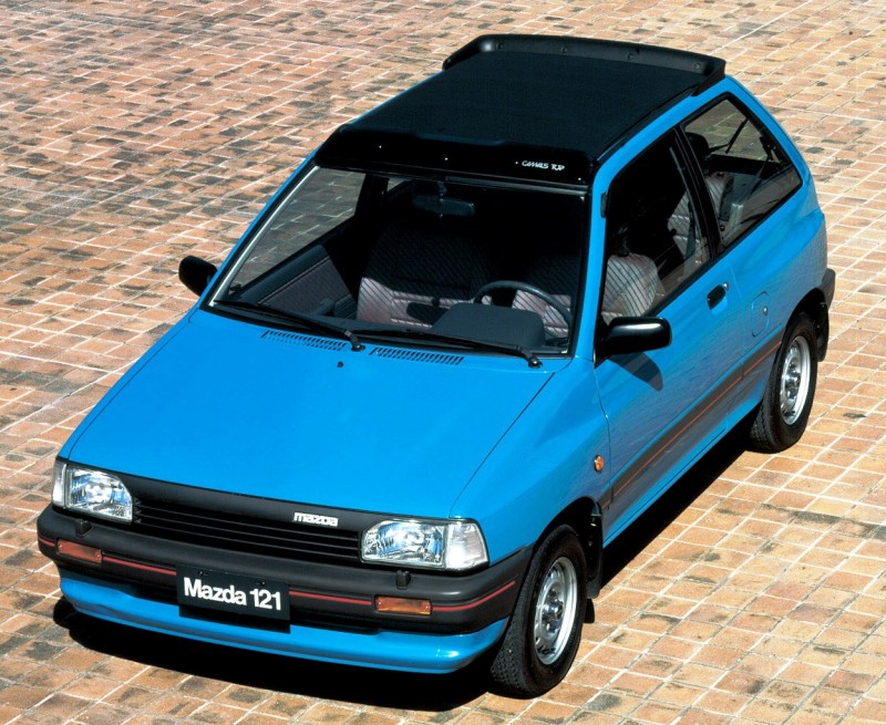 Az első generáció szolgálta Mazda, Ford, majd később KIA jelvénnyel is